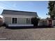 Charming single-story home with a gray roof and xeriscaped front yard at 2349 W Shaw Butte Dr, Phoenix, AZ 85029