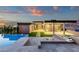 Exterior elevation view of the home and outdoor pool and lounge areas, designed for elegant entertaining at 26885 N 87Th Dr, Peoria, AZ 85383