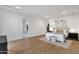 Bright and spacious main bedroom with hardwood floors, and natural light at 26885 N 87Th Dr, Peoria, AZ 85383