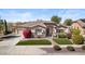 Charming single-story home with well-manicured lawn and stone accents, boasting great curb appeal at 27016 N 20Th Ln, Phoenix, AZ 85085