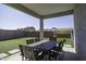 Relaxing backyard area with patio furniture and outdoor play set at 281 S San Gregorio Ln, Casa Grande, AZ 85194