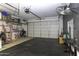 Spacious garage with ample room for storage and gym equipment; perfect for organization and fitness at 281 S San Gregorio Ln, Casa Grande, AZ 85194