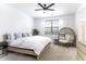 Serene main bedroom with neutral décor, a ceiling fan, and natural light at 281 S San Gregorio Ln, Casa Grande, AZ 85194