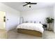 Spacious main bedroom with ceiling fan and neutral color scheme at 281 S San Gregorio Ln, Casa Grande, AZ 85194