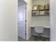 Cozy office space with built-in desk and shelving with shiplap detail at 281 S San Gregorio Ln, Casa Grande, AZ 85194