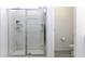 Bright bathroom with a large glass-enclosed shower and tile flooring at 281 S San Gregorio Ln, Casa Grande, AZ 85194
