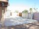 Spacious backyard featuring storage sheds and secured gates, perfect for storage and privacy at 2901 W Straford Dr, Chandler, AZ 85224