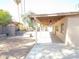 Expansive backyard with a covered patio and a built-in BBQ area, ideal for outdoor relaxation and entertainment at 2901 W Straford Dr, Chandler, AZ 85224