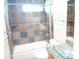 Bathroom features tiled shower, tub, and modern vanity at 2901 W Straford Dr, Chandler, AZ 85224