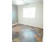 This bedroom boasts beautiful tile flooring and ample natural light from a window at 2901 W Straford Dr, Chandler, AZ 85224
