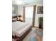 Cozy bedroom with a comfortable bed, stylish decor, and a ceiling fan at 2901 W Straford Dr, Chandler, AZ 85224