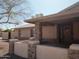 Home exterior featuring desert landscaping, decorative stone accents, and covered entryway at 2901 W Straford Dr, Chandler, AZ 85224