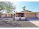 Charming single-story home featuring a well-maintained front yard and attached two-car garage at 2901 W Straford Dr, Chandler, AZ 85224