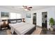 Serene main bedroom with a large bed, closet and an ensuite bathroom for added privacy at 2901 W Straford Dr, Chandler, AZ 85224