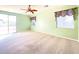 Green bedroom with sliding glass door for accessing to back patio at 3807 E Latham Ct, Gilbert, AZ 85297