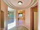 Hallway with decorative ceiling and access to multiple rooms at 3807 E Latham Ct, Gilbert, AZ 85297