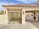 Two car garage with open door and access to carport at 3807 E Latham Ct, Gilbert, AZ 85297