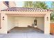 Spacious three-car garage with a water heater and plenty of open space at 3807 E Latham Ct, Gilbert, AZ 85297