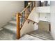 Carpeted staircase with wood and iron railing leading to the upper level at 3807 E Latham Ct, Gilbert, AZ 85297