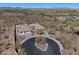 Breathtaking aerial view featuring the home nestled in a desert landscape with views of the surrounding community at 41310 N Clear Crossing Ct, Anthem, AZ 85086