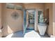 Welcoming entryway featuring tile flooring and a view into the living room at 41310 N Clear Crossing Ct, Anthem, AZ 85086