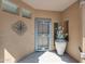 Inviting front porch with decorative metalwork and a view of the front entryway at 41310 N Clear Crossing Ct, Anthem, AZ 85086