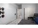 Bright bedroom with a sliding-door closet and a comfortable chair, offering a relaxing retreat at 42207 N 45Th Dr, Phoenix, AZ 85086