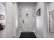 Bright and inviting foyer with a decorative front door and tile flooring at 42207 N 45Th Dr, Phoenix, AZ 85086