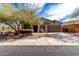 Charming single-story home with desert landscaping and a spacious driveway at 42207 N 45Th Dr, Phoenix, AZ 85086