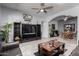Comfortable living room with a ceiling fan, spacious furniture, and stylish decor create a welcoming atmosphere at 42207 N 45Th Dr, Phoenix, AZ 85086