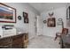 Office space with decor and storage, creating a functional and personalized work environment at 42207 N 45Th Dr, Phoenix, AZ 85086