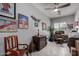 Home office with a ceiling fan, a desk, and comfortable seating for a productive workspace at 42207 N 45Th Dr, Phoenix, AZ 85086
