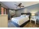 Comfortable bedroom with a plush bed, desk, and private balcony, perfect for relaxing and unwinding at 4303 E Cactus Rd # 308B, Phoenix, AZ 85032