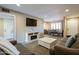 Open-concept living room and dining area with lots of natural light at 4303 E Cactus Rd # 308B, Phoenix, AZ 85032