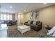 Spacious living room that connects dining area with modern decor and natural light at 4303 E Cactus Rd # 308B, Phoenix, AZ 85032