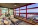 Relaxing outdoor balcony with comfortable seating and stunning views of the surrounding cityscape and waterfront at 4808 N 24Th St # 1305, Phoenix, AZ 85016