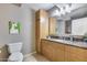 Well-lit bathroom with a combination vanity and storage and a spacious shower at 4808 N 24Th St # 1305, Phoenix, AZ 85016