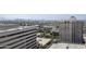 This aerial view captures nearby parking and surrounding urban landscape of property at 4808 N 24Th St # 1305, Phoenix, AZ 85016