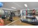 Spacious gym featuring diverse exercise equipment, including treadmills, bikes, and weight machines at 4808 N 24Th St # 1305, Phoenix, AZ 85016