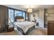 Beautifully decorated main bedroom with large window offering natural light and views at 4808 N 24Th St # 1305, Phoenix, AZ 85016