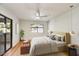 Bright bedroom with a sliding glass door and modern decor at 5104 N 32Nd St # 431, Phoenix, AZ 85018