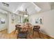 Charming dining area featuring a round wooden table and stylish decor at 5104 N 32Nd St # 431, Phoenix, AZ 85018