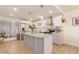 Modern kitchen with stainless steel appliances, a kitchen island, and plenty of cabinet space at 5122 N 31St Way # 238, Phoenix, AZ 85016