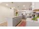 Well-lit kitchen with an island, stainless steel refrigerator, and modern fixtures at 5122 N 31St Way # 238, Phoenix, AZ 85016