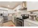 Updated kitchen with stainless steel appliances, modern countertops, and a stylish backsplash at 5122 N 31St Way # 238, Phoenix, AZ 85016