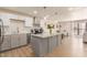 Spacious kitchen featuring an island, modern appliances, and stylish cabinets at 5122 N 31St Way # 238, Phoenix, AZ 85016