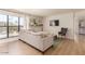 Stylish living room with a large window, plush sofa, and a contemporary entertainment setup at 5122 N 31St Way # 238, Phoenix, AZ 85016