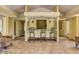 Lobby seating area including a bar counter with chairs at 5122 N 31St Way # 238, Phoenix, AZ 85016