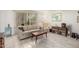 Bright living room with a large window and neutral-toned furniture at 5910 N 86Th St, Scottsdale, AZ 85250