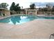 Community swimming pool with chairs and shaded seating area at 5910 N 86Th St, Scottsdale, AZ 85250